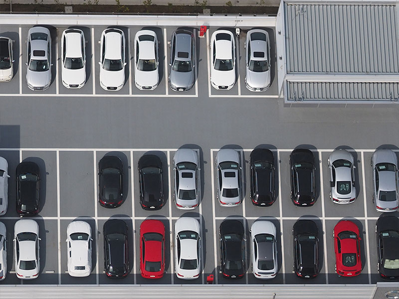 An aerial photograph of a car park demonstrating a need for car park management strategies