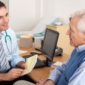 Photograph of a doctor and patient