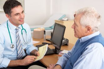 Photograph of a doctor and patient