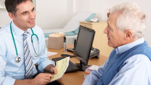 Photograph of a doctor and patient