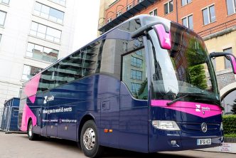 A photograph of a Zeelo coach