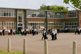 A photograph from a distance of a high school